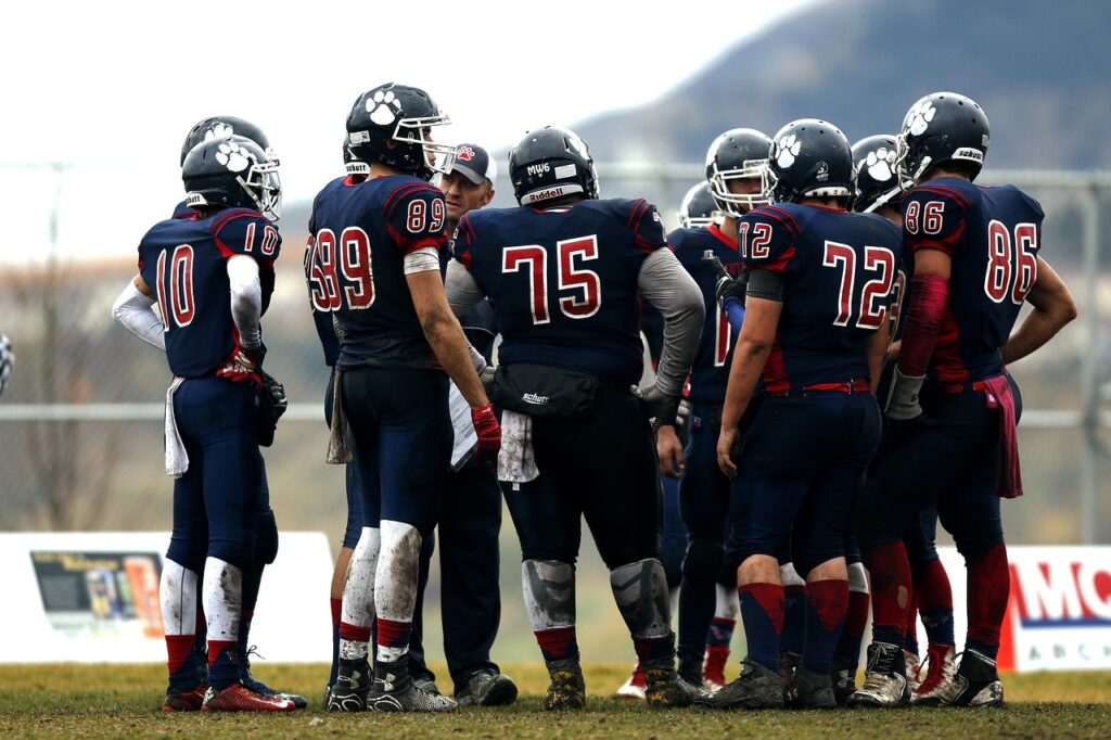 football team, huddle, teamwork, athletes, coach, players, game, player, team, canadian, competition, action, football, football field, sport, american football, outdoors, canada, huddle, huddle, huddle, huddle, huddle, american football, american football